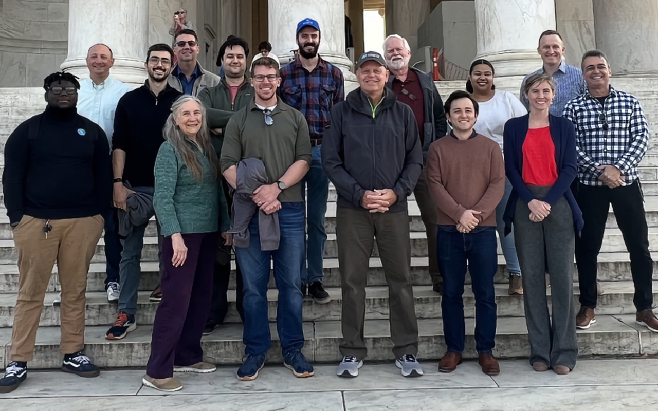 ETC Employees pose for a photo.