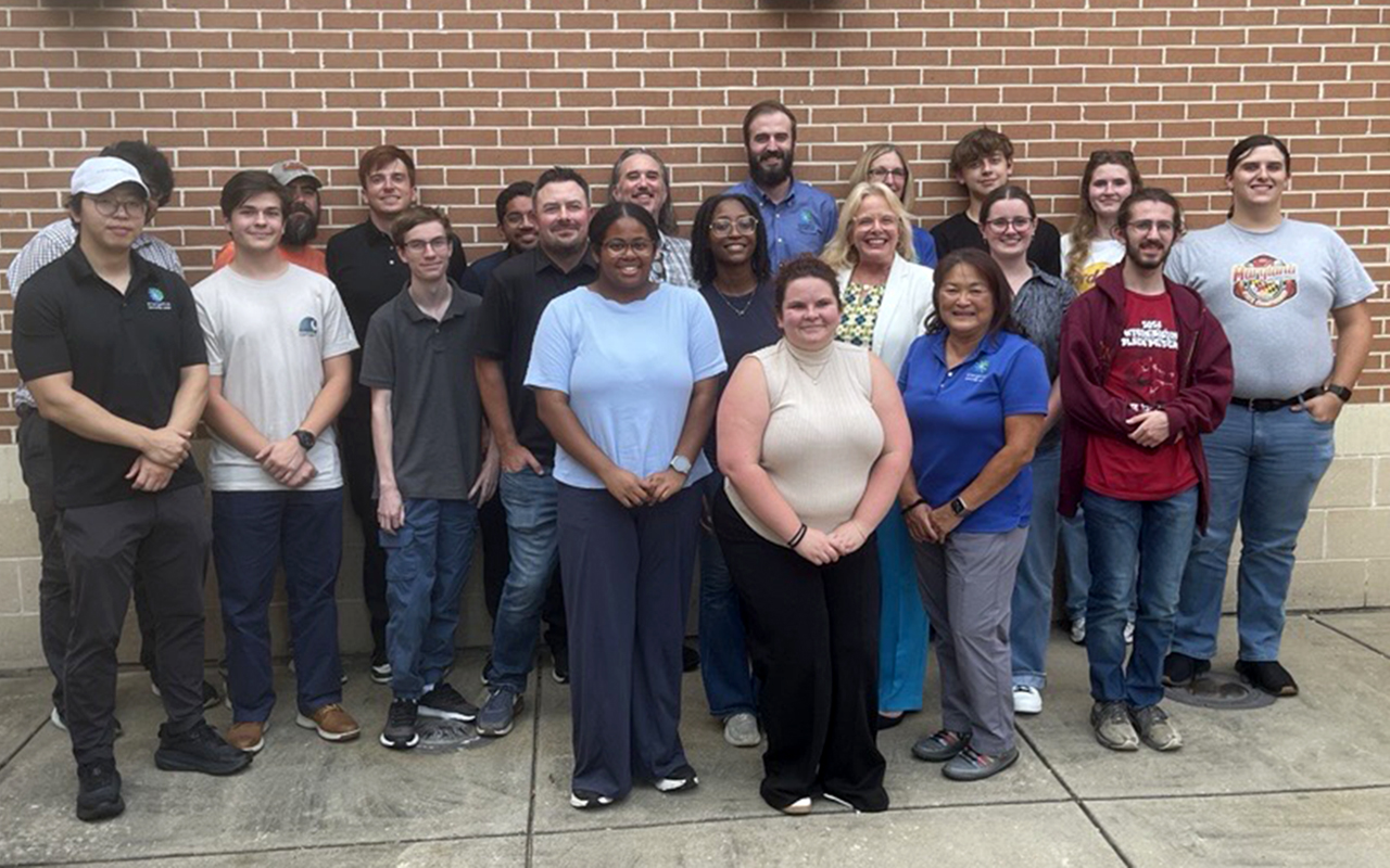 ETC Employees pose for a group photo.